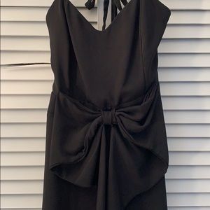 Black, open-back mini-dress